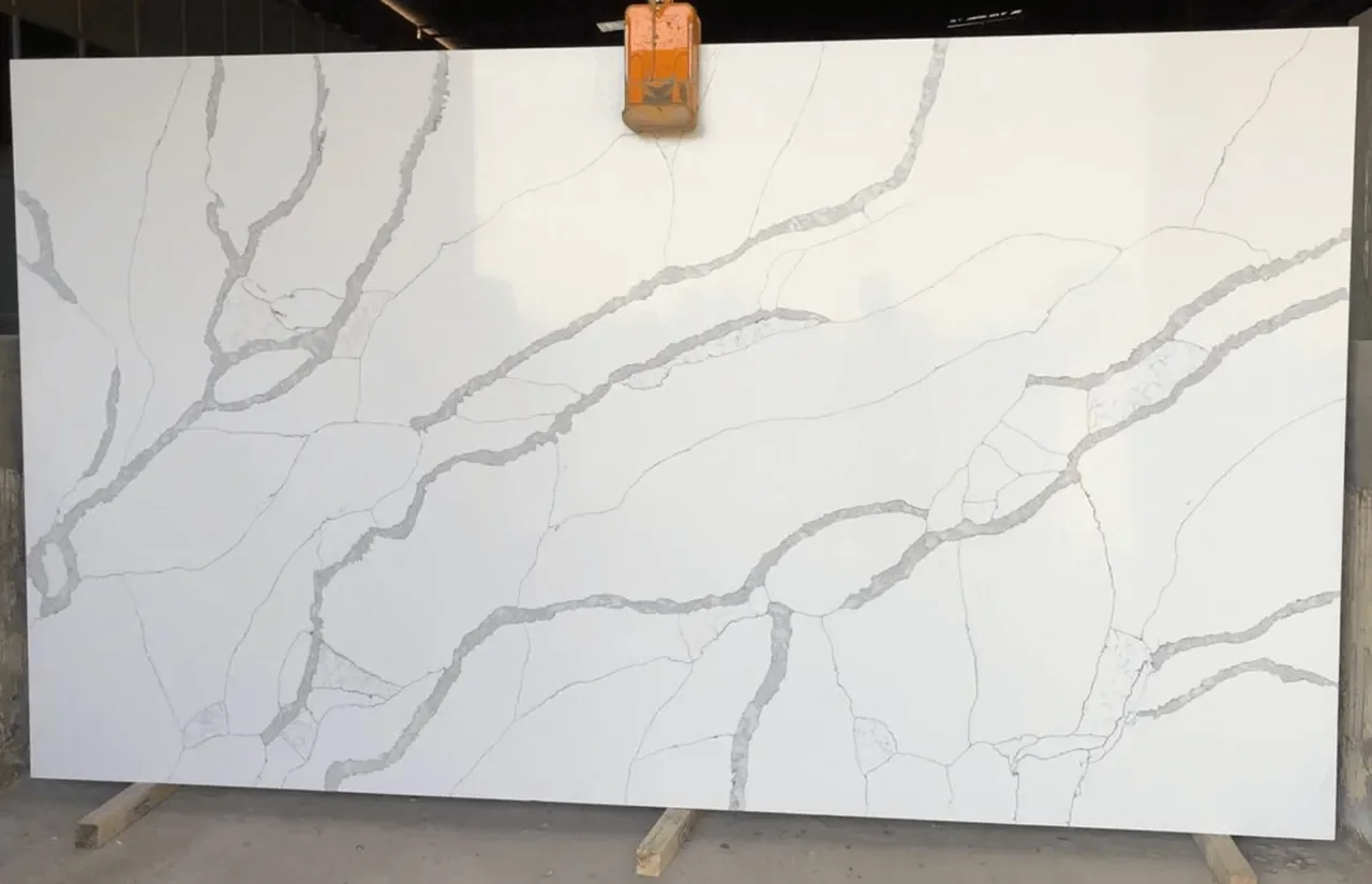White slab with sweeping gray veins displayed upright