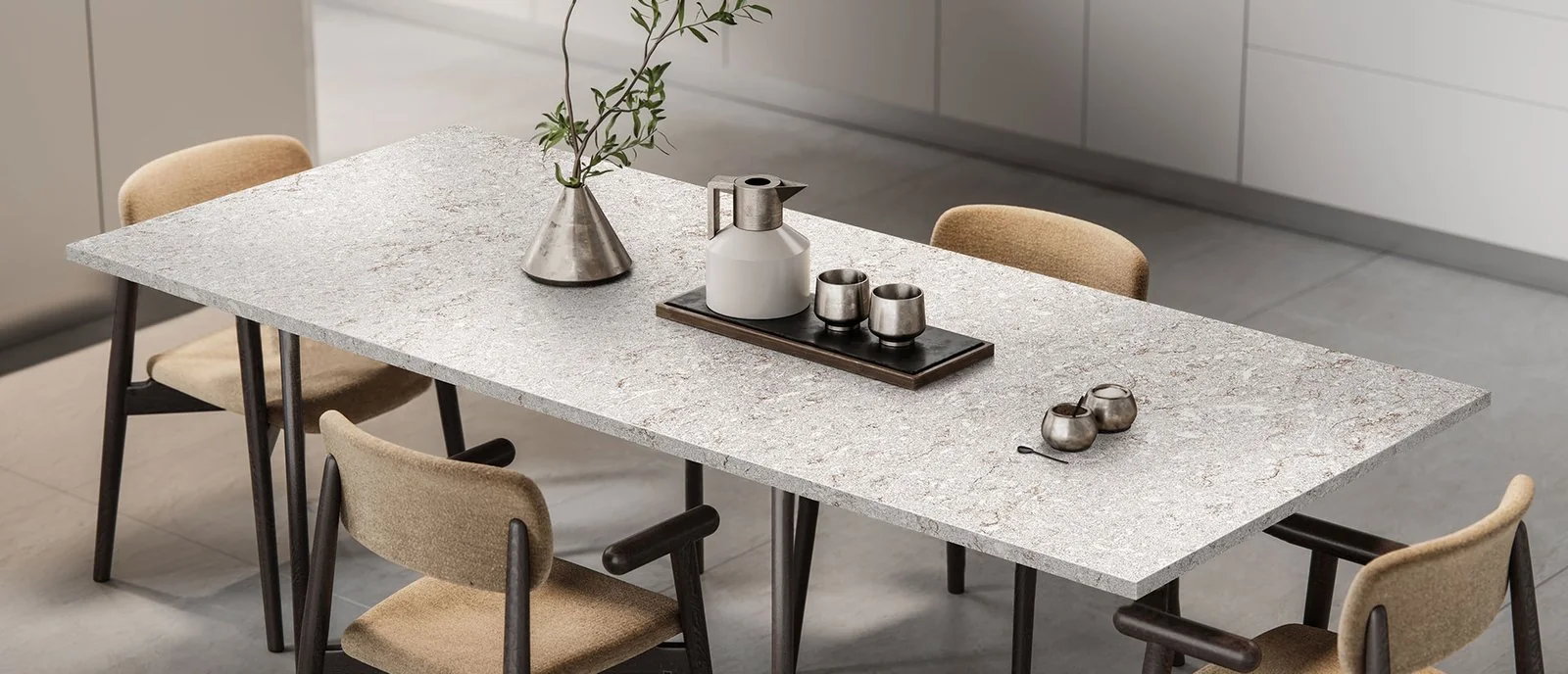 Rectangular light gray patterned tabletop with upholstered dining chairs