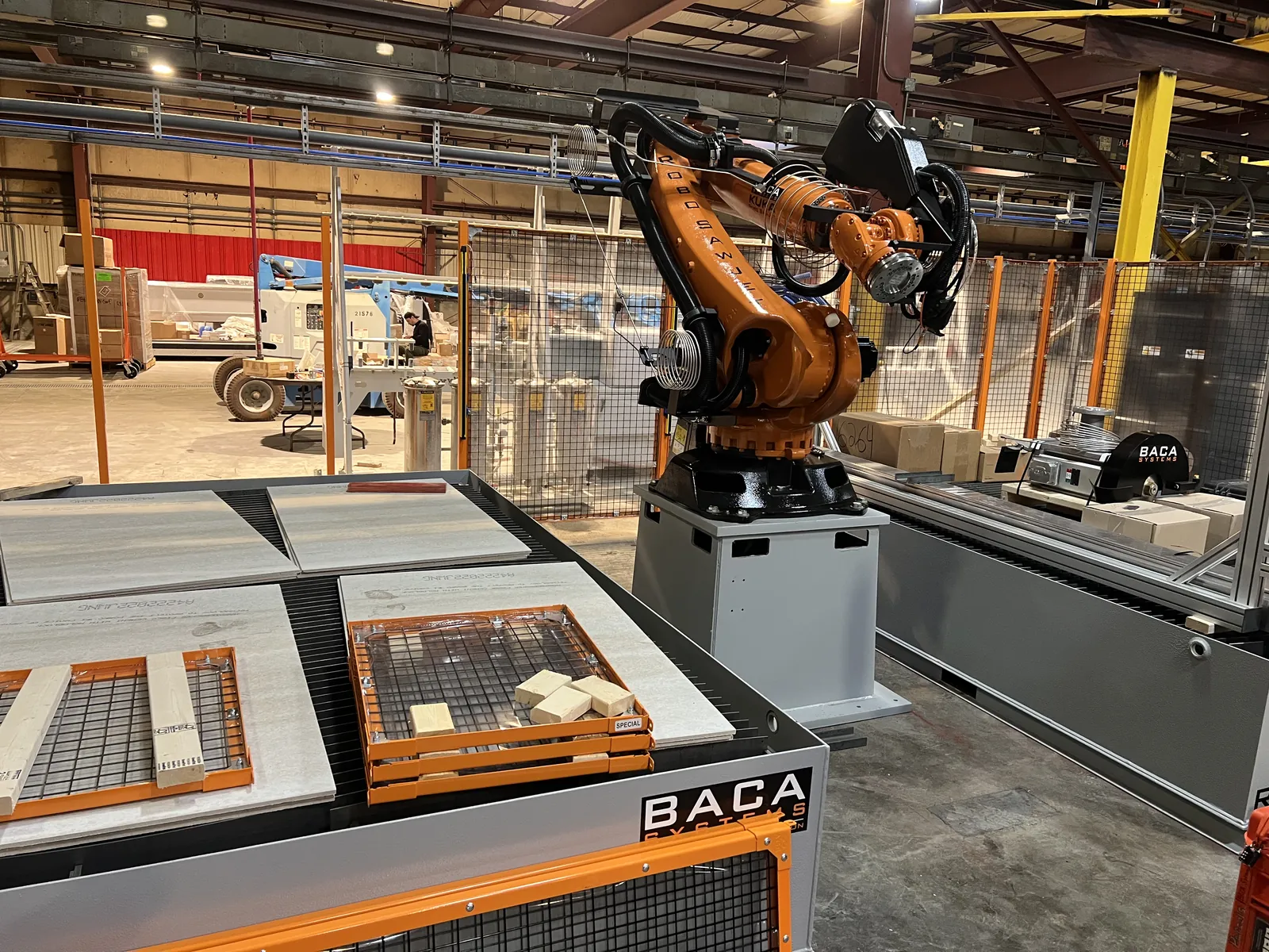 Robotic SawJet arm and cutting table used in countertop fabrication