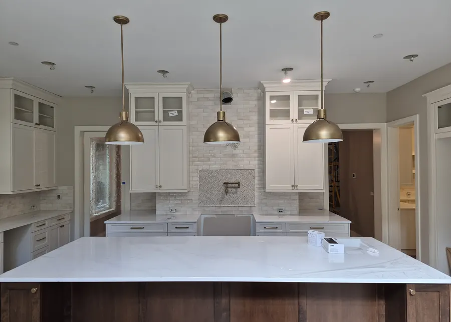 White top, walnut base, pendants. A Top Granite project