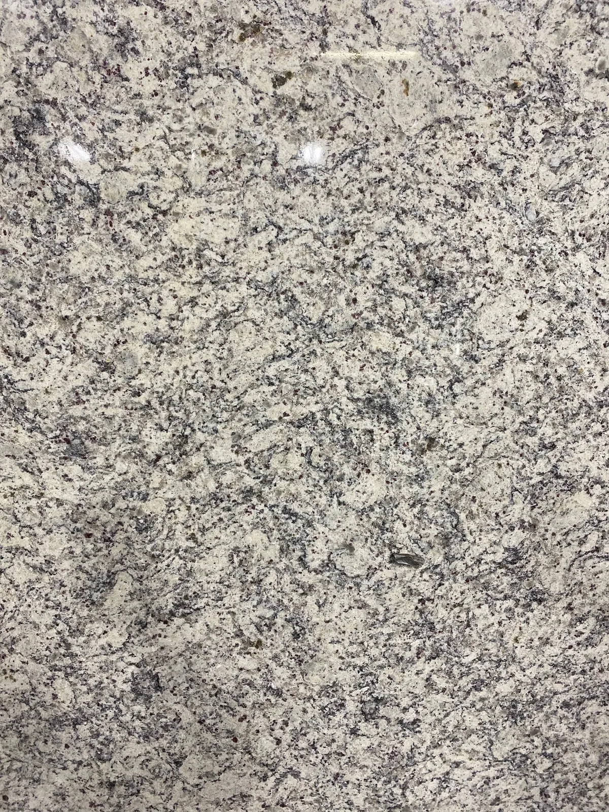 Dallas White 3cm Leathered slab at Easy Stones Seattle