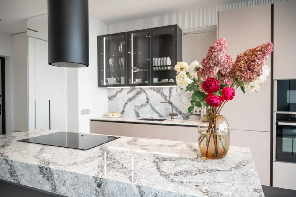 Kitchen in new luxury home with quartz table